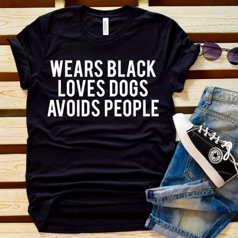 Wears Black Loves Dogs SVG Saying
